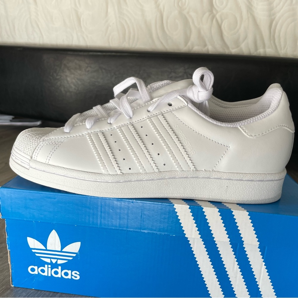 White Adidas Superstar W; Size 7.5; New in box; Perfect condition.